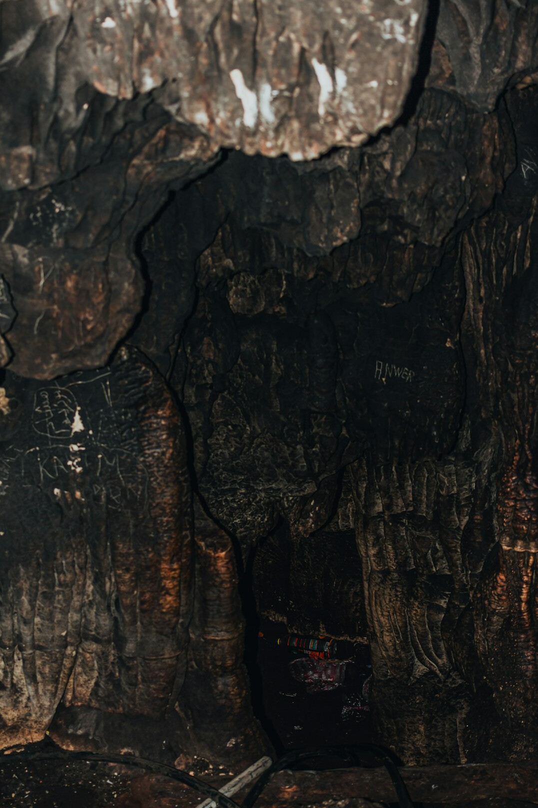 mysterious cave interior with light beams